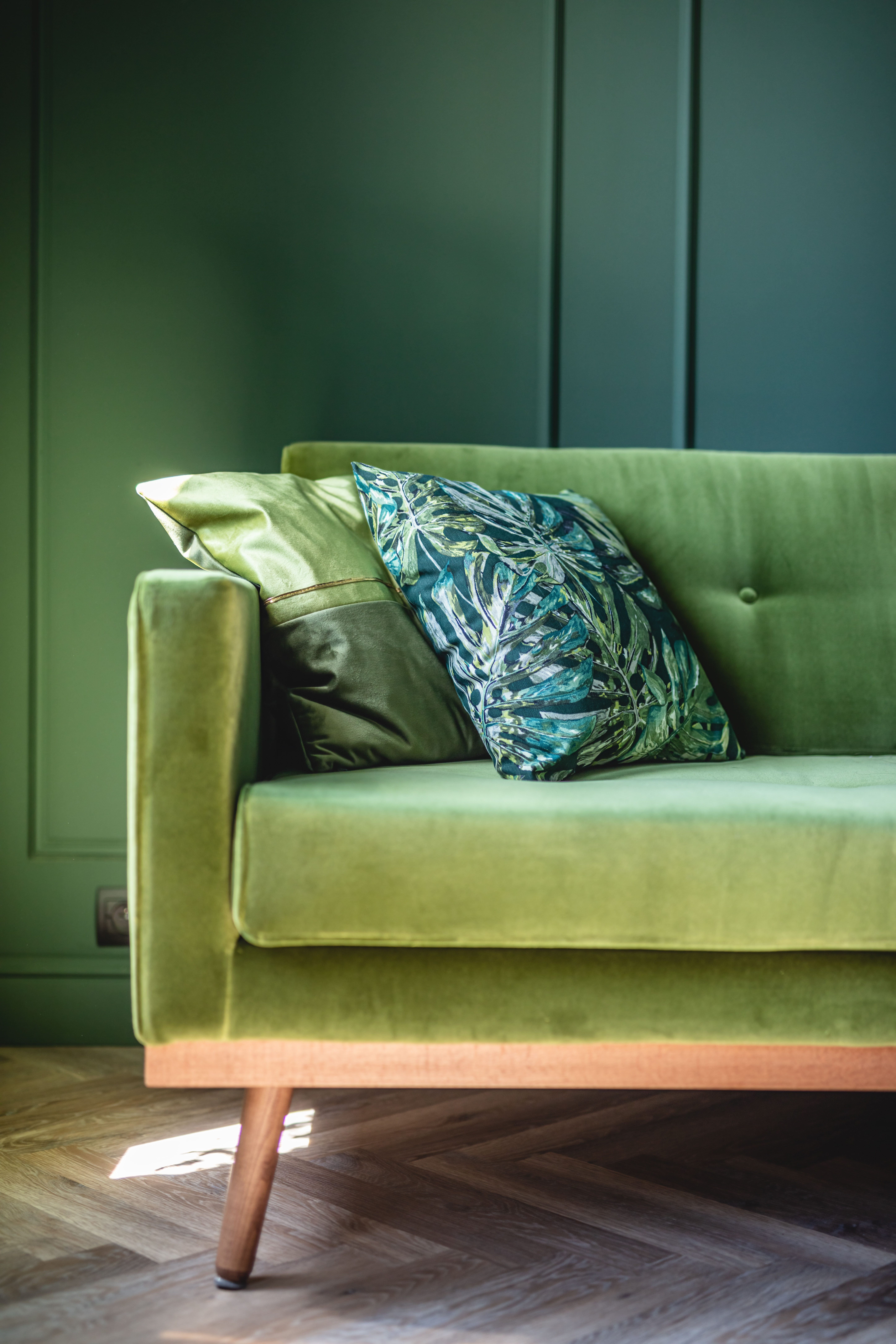 Green Sofa in Elegant Apartment. Home Staging